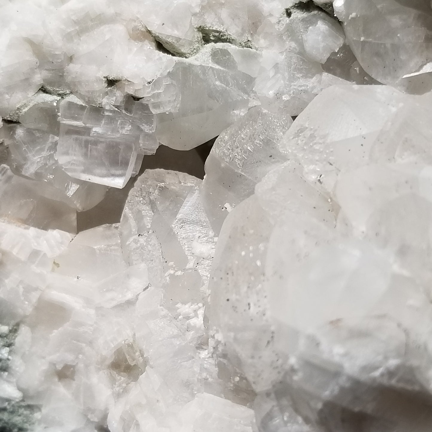 #11202 White Dolomite coating and Chalcopyrite on clear Combined form Calcite with Chalcopyrite inclusions