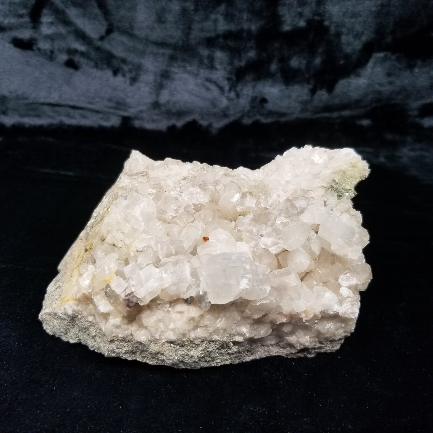 #11205 Pyrite and orange strange formation on clear Combined form Calcite with pyrite inclusions on matrix