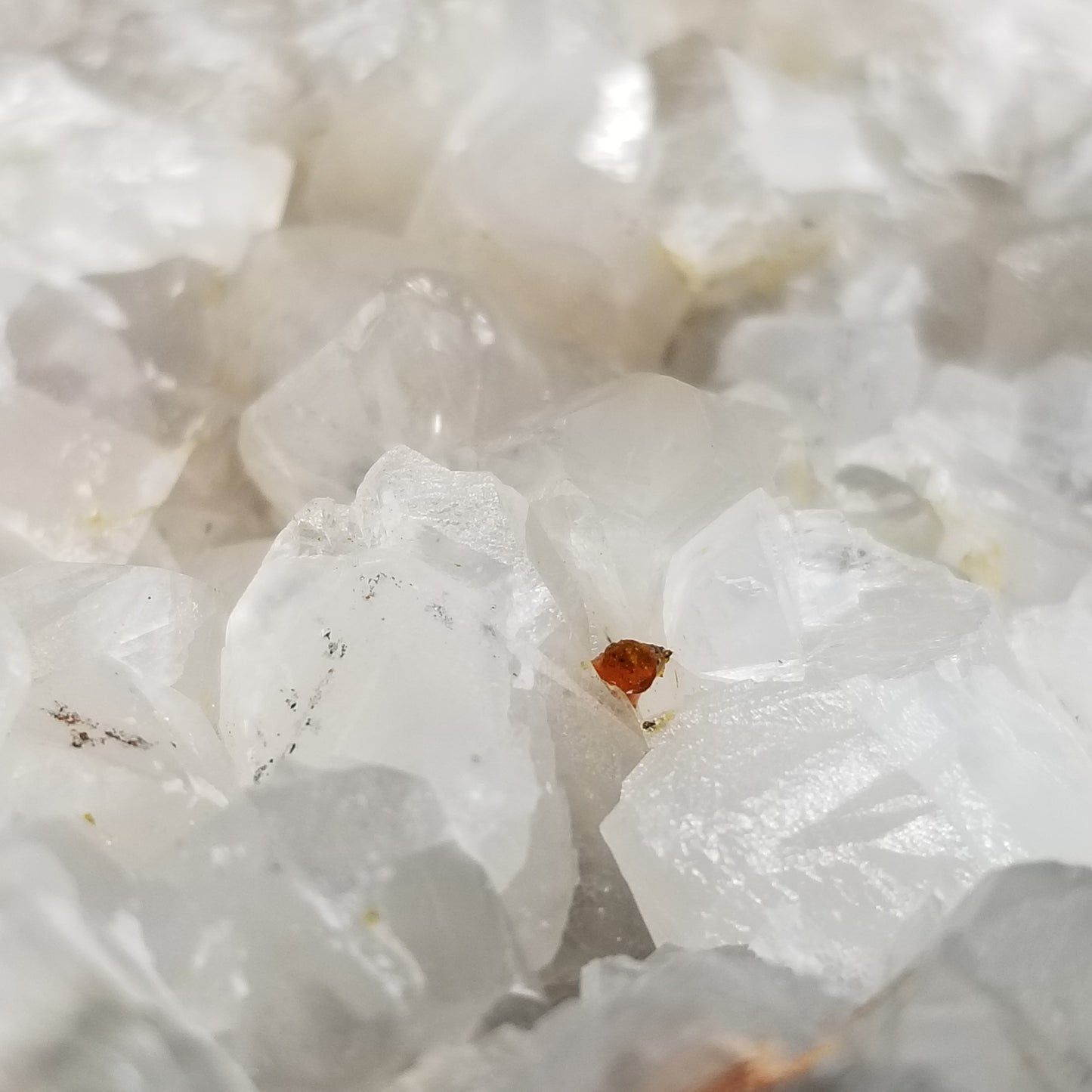 #11205 Pyrite and orange strange formation on clear Combined form Calcite with pyrite inclusions on matrix