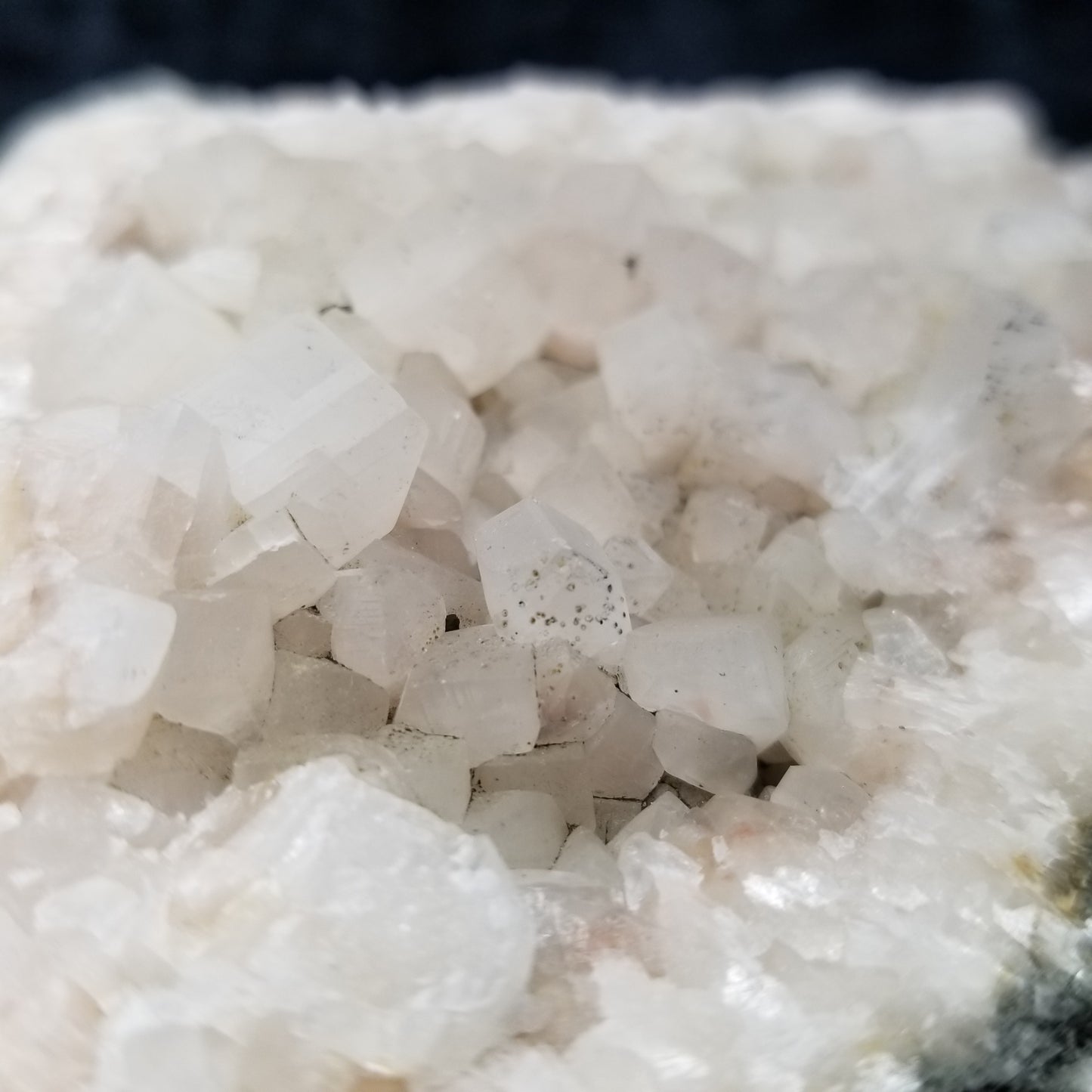 #11231 Chalcopyrite on clear Combined form Calcite with Hematite inclusions on matrix