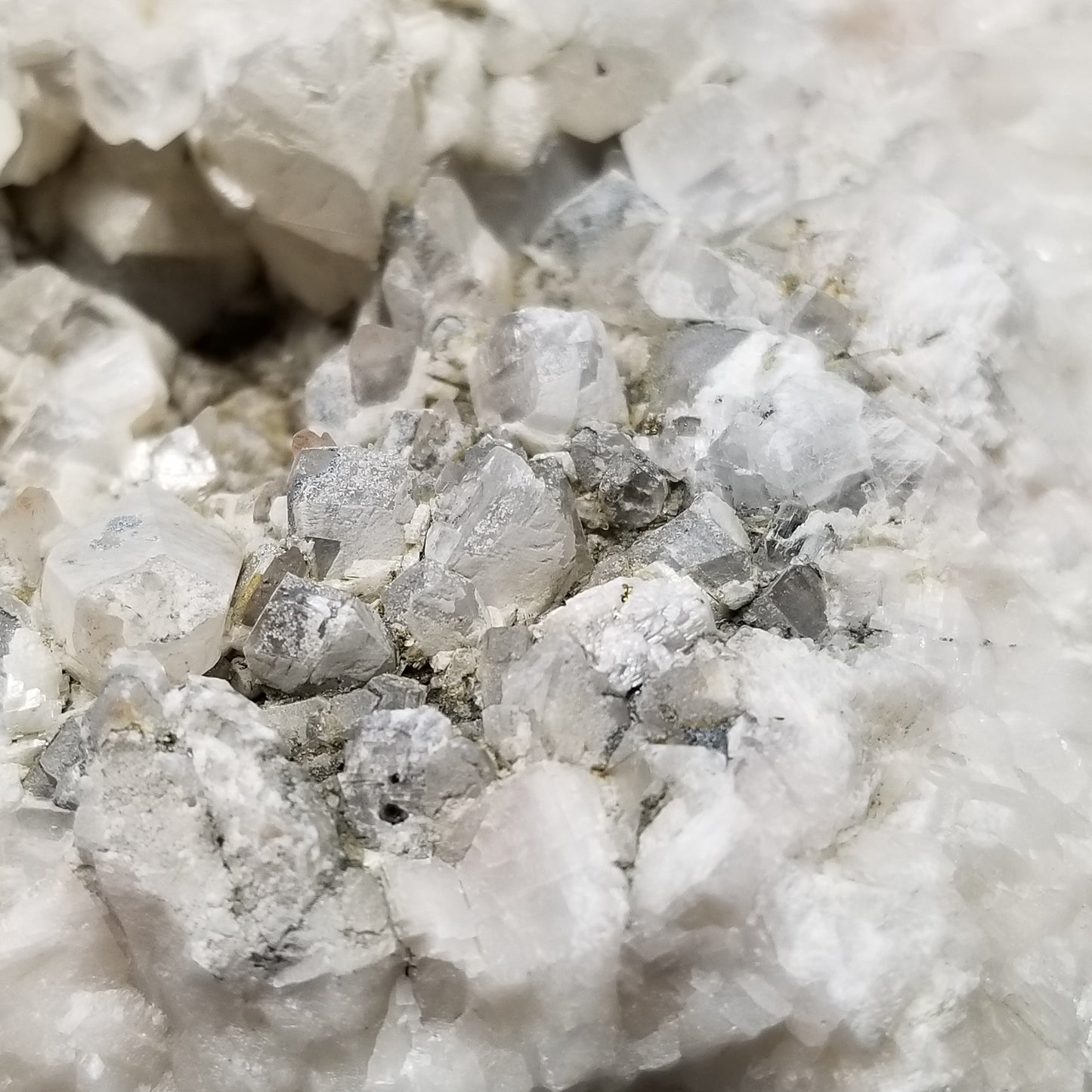 #11266 White Dolomite and Chalcopyrite on Combined form Calcite cluster on matrix