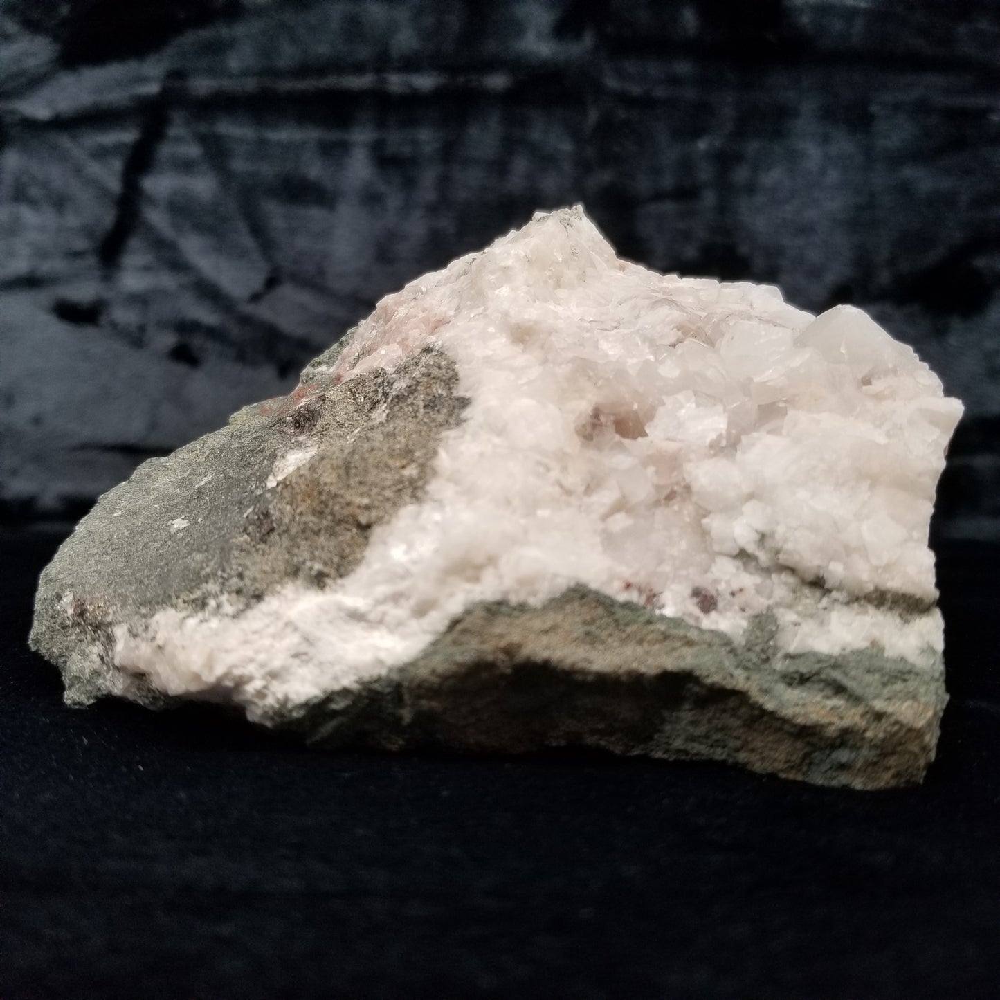 #11268 Chalcopyrite on white Calcite with Hematite inclusions formation