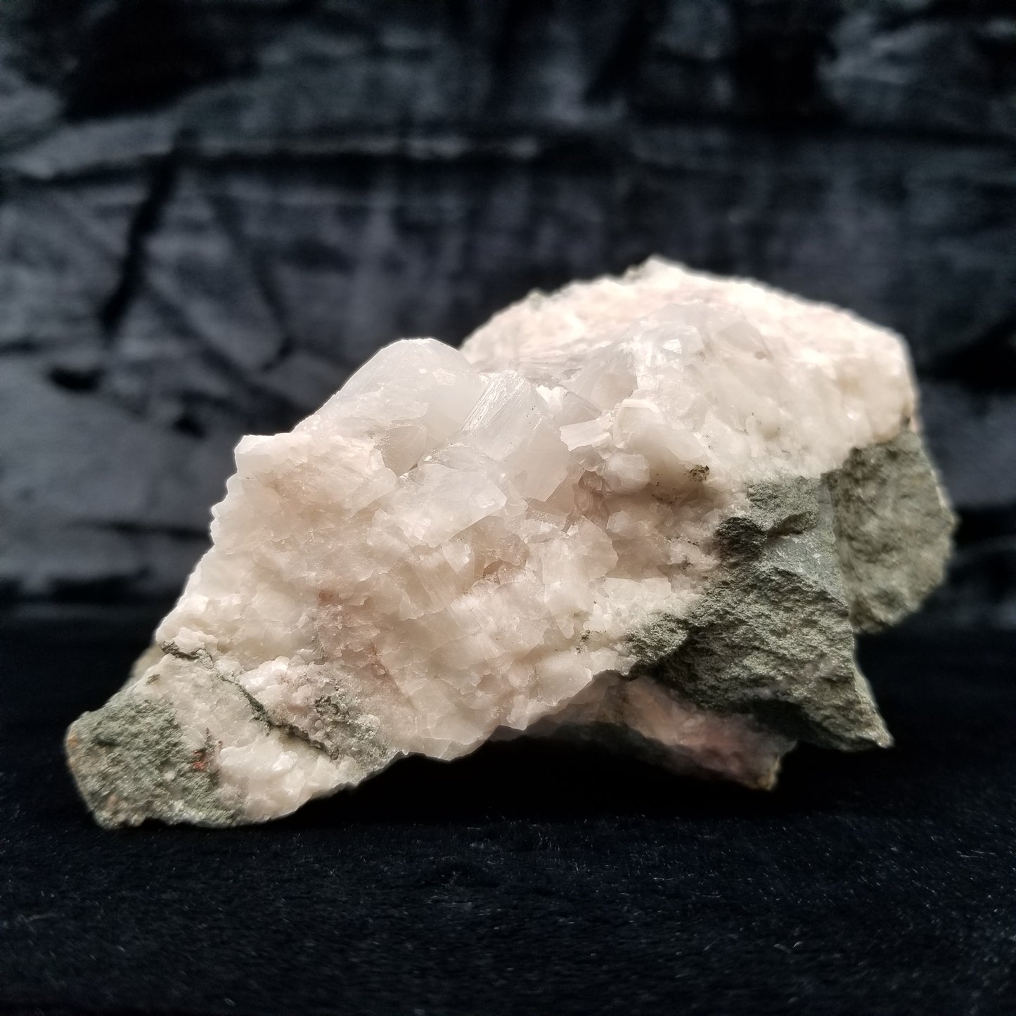 #11268 Chalcopyrite on white Calcite with Hematite inclusions formation