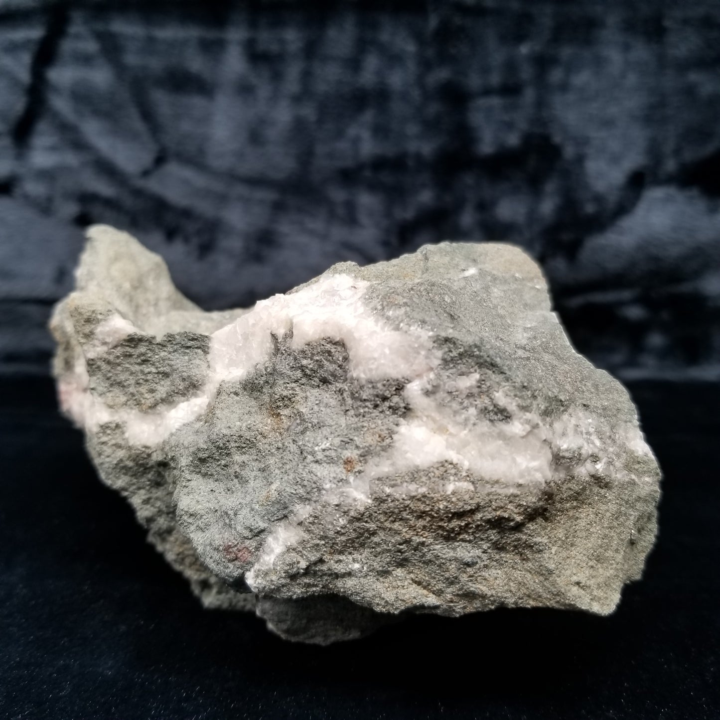 #11286 Chalcopyrite on clear Combined form Calcite with Hematite inclusions