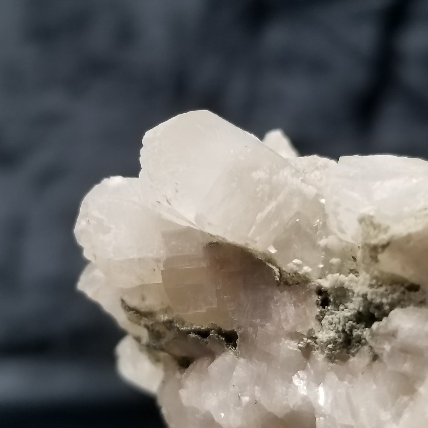 #11288 Green coating on clear Combined form Calcite on matrix