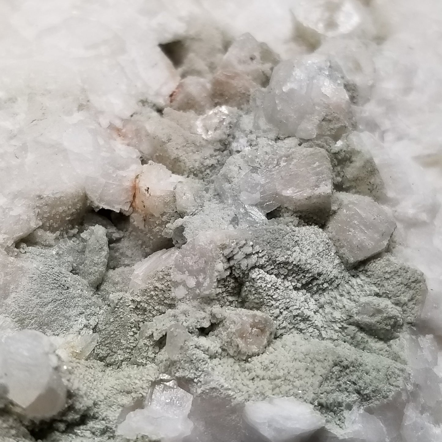 #11288 Green coating on clear Combined form Calcite on matrix
