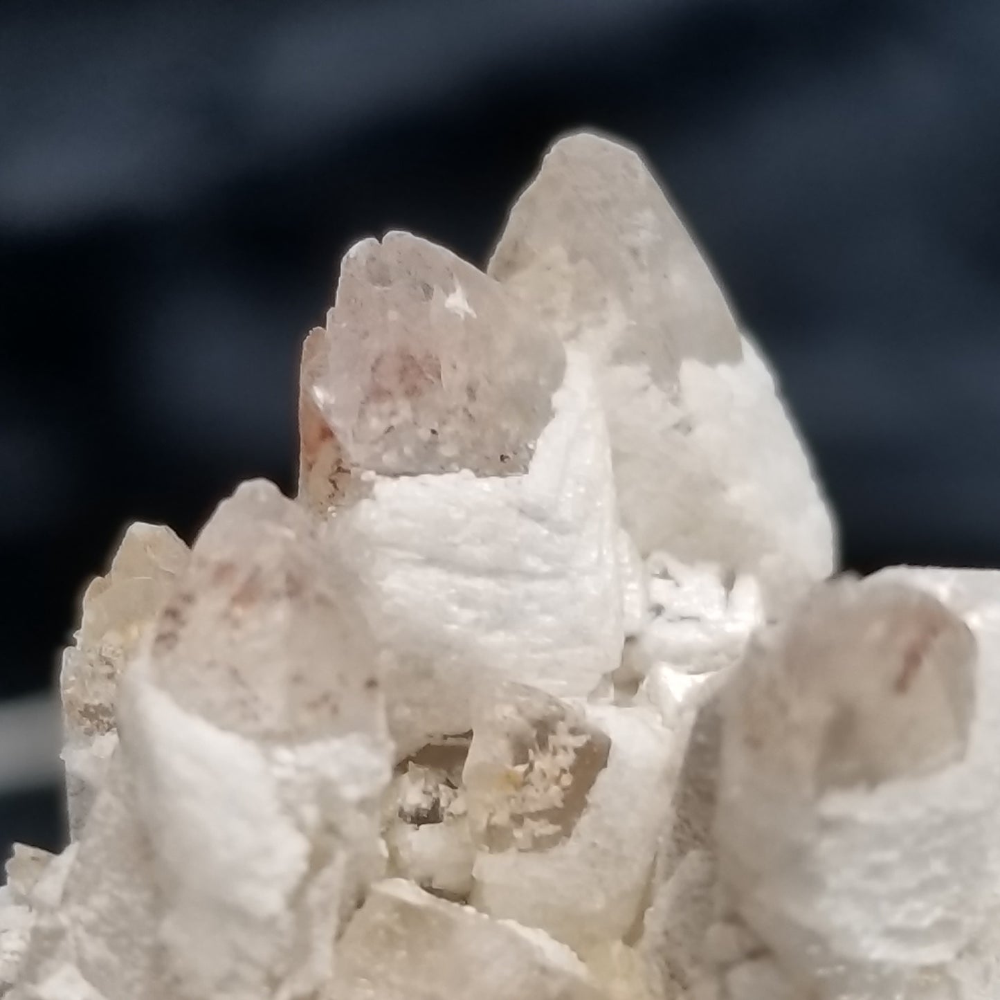 #11348 White Dolomite and Chalcopyrite on clear Combined form Calcite cluster with Hematite inclusions on matrix
